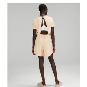 Lululemon Lightweight High-Neck Romper in
Prosecco Sz. 10